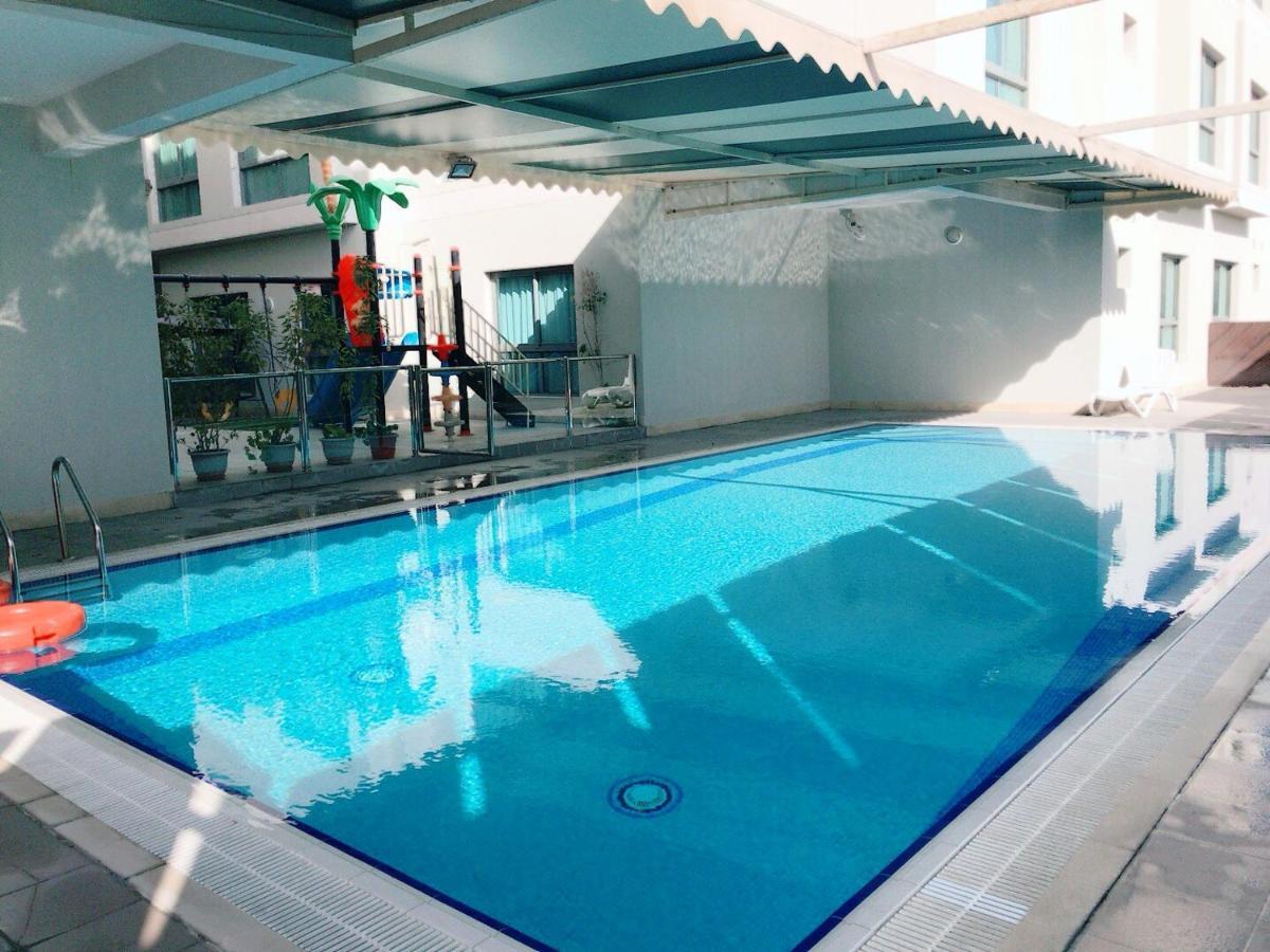 Stout Apartments Manama Bilik gambar
