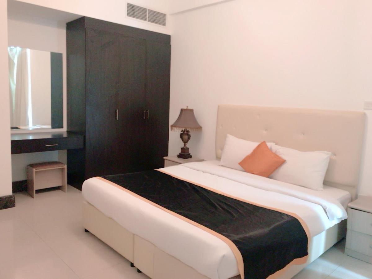 Stout Apartments Manama Bilik gambar